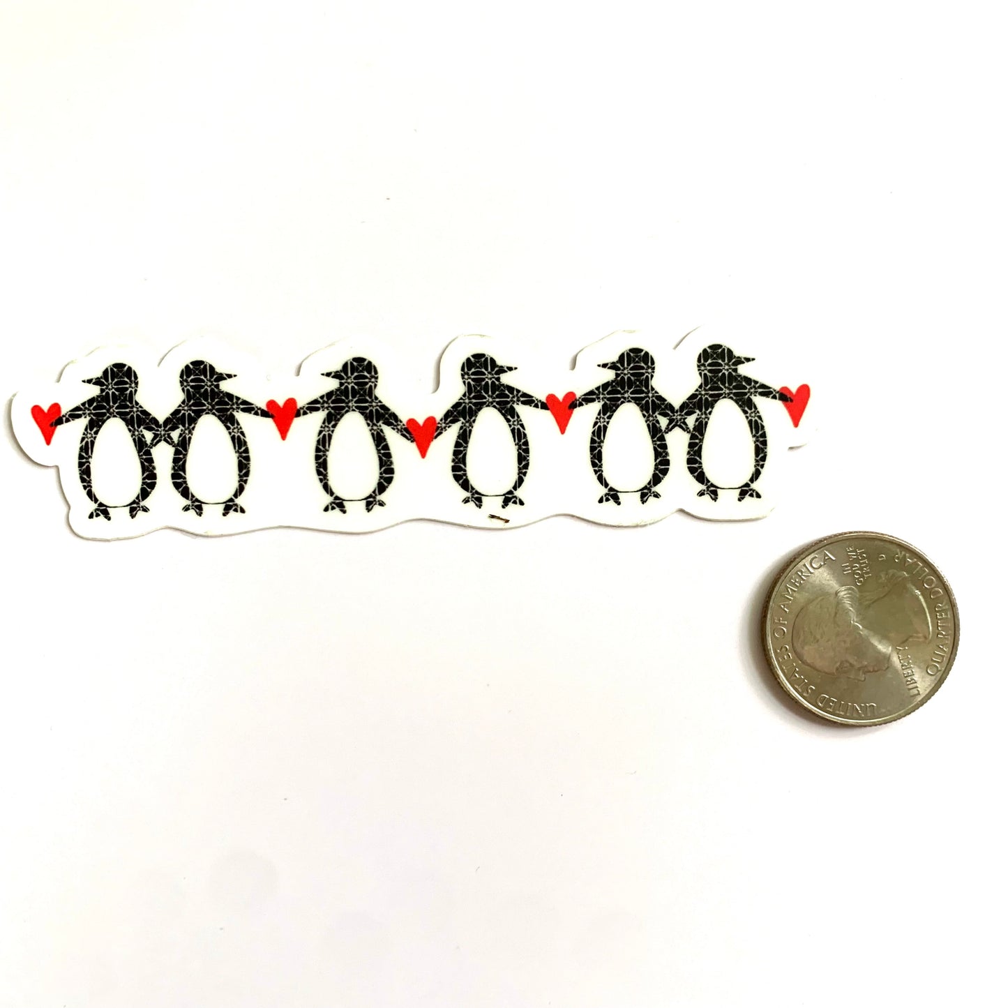 A Row of Penguins Sticker