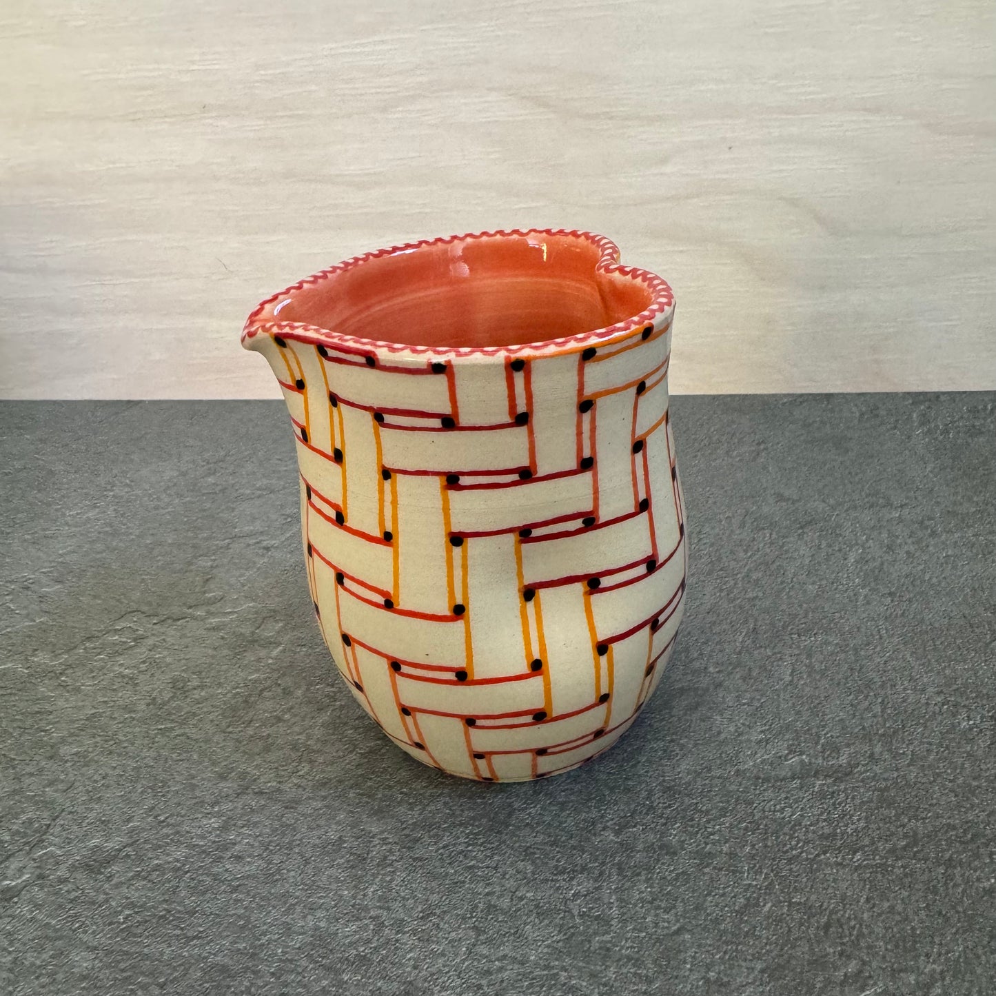 Heart Cup with Woven Orange and Red Ribbons