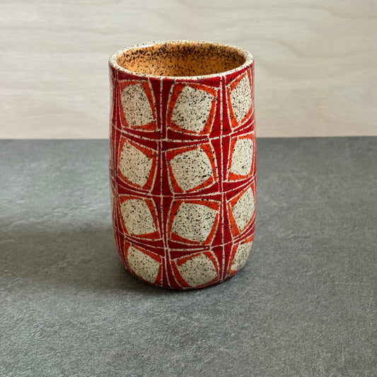 Orange and Red Cup with Tilting Square Tangles