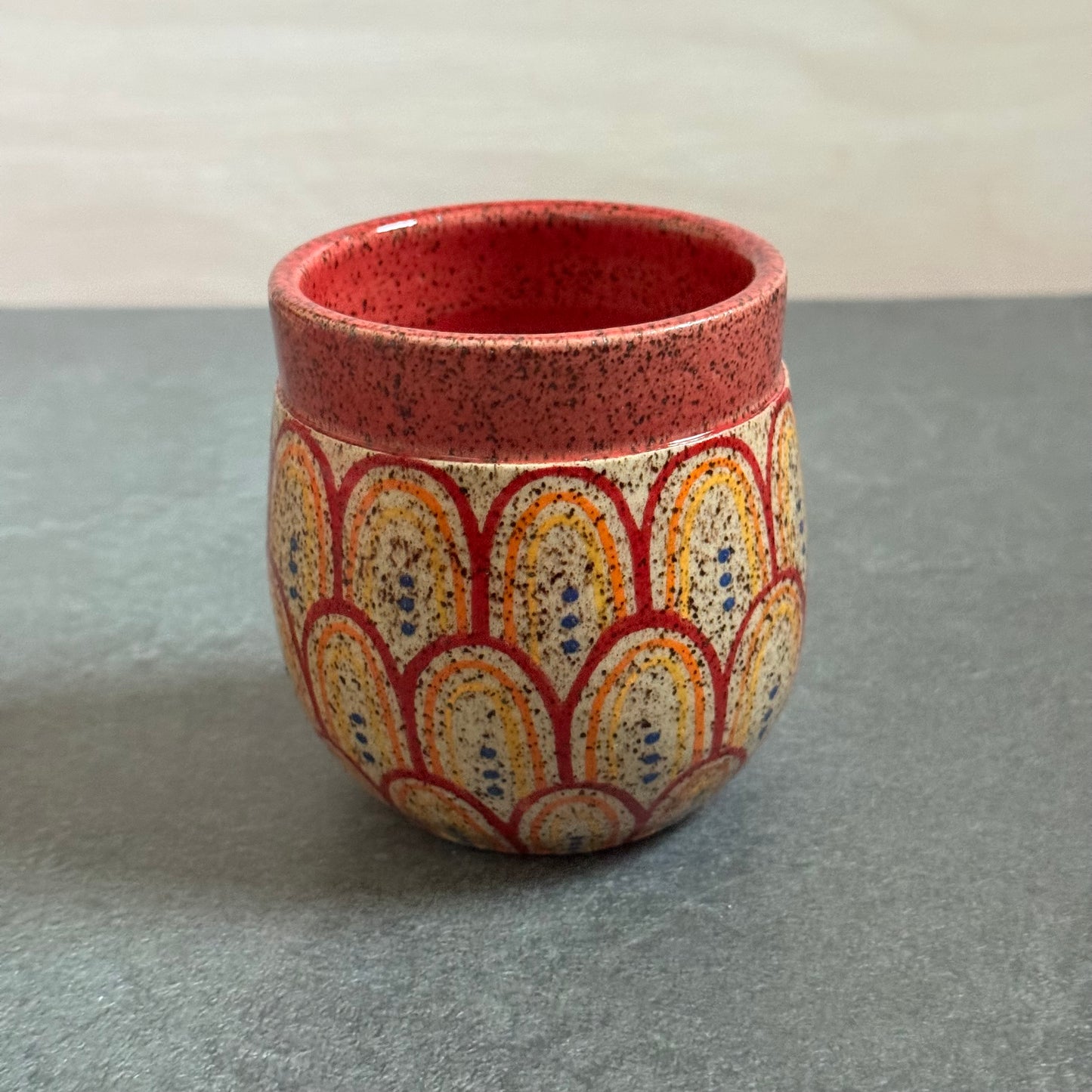 Banded Cup with Red & Orange Rainbow Tangle